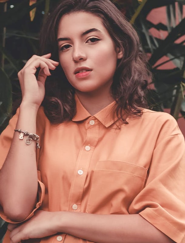 Woman in an orange shirt